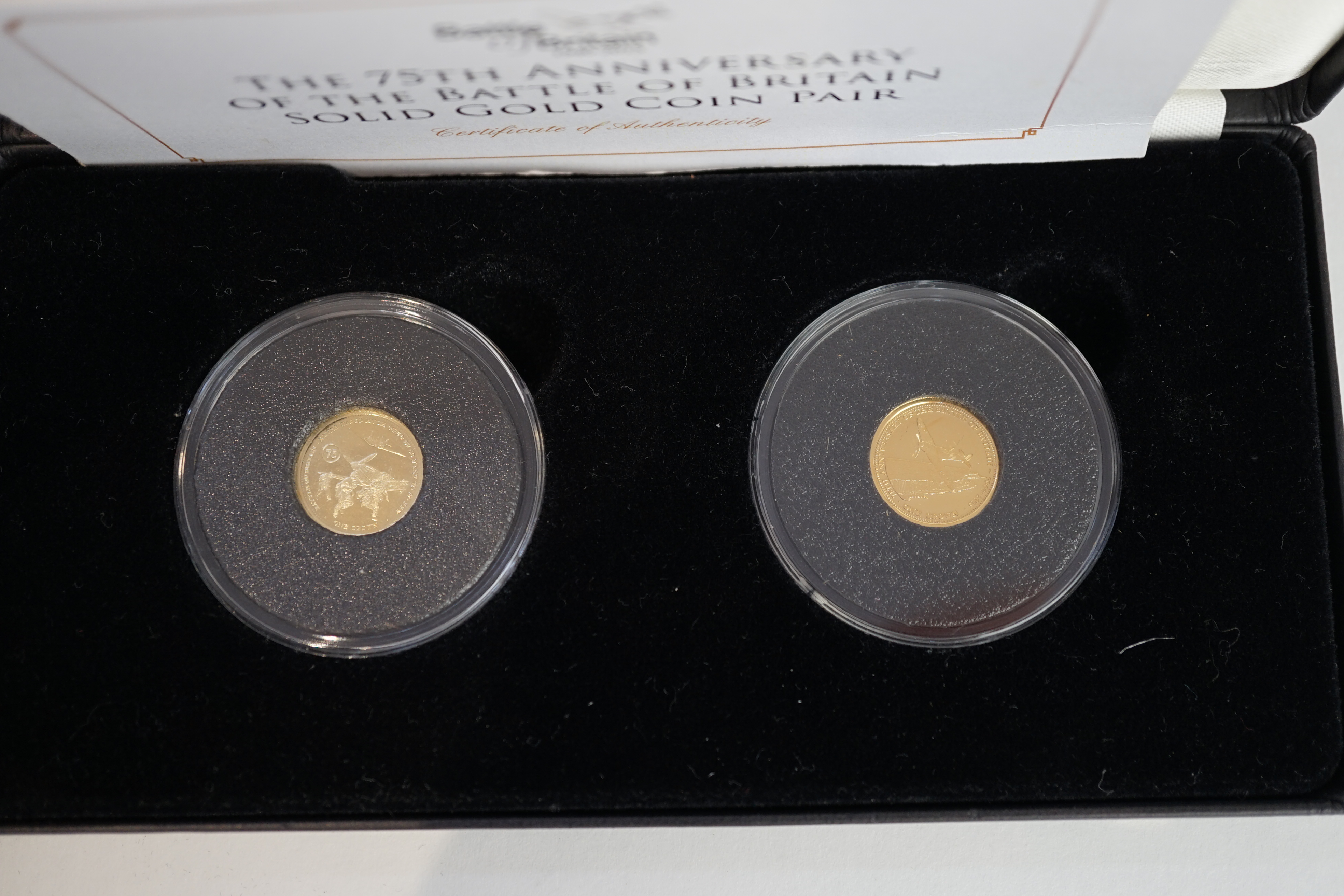 Gold commemorative coins, Elizabeth II, Tristan da Cunha, The route to victory 9ct. gold crown four coin collection, each 1g and the 75th anniversary of the Battle of Britain 9ct. gold crown pair, each 1g, each set in a